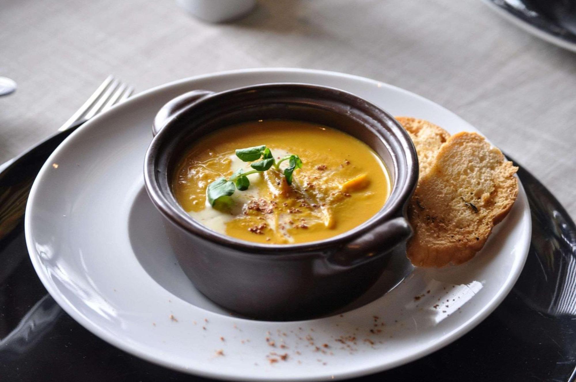 Radisson Blu Acqua Hotel & Spa Concon Exterior photo A bowl of soup with crusty bread